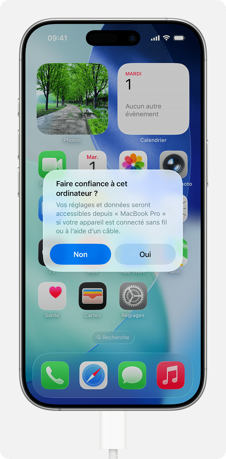 Alerte « Faire confiance à cet ordinateur ? » affichée sur l’écran d’un iPhone connecté à l’aide d’un câble USB.